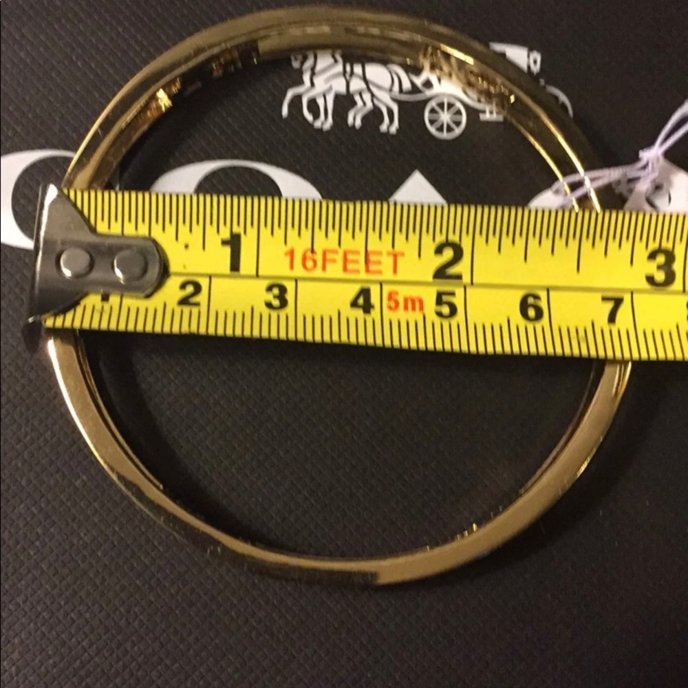 ⭐️💫COACH NWT CLASSIC HORSE & CARRIAGE GOLD BANGLE STUNNING AND PRISTINE … - Picture 7 of 8
